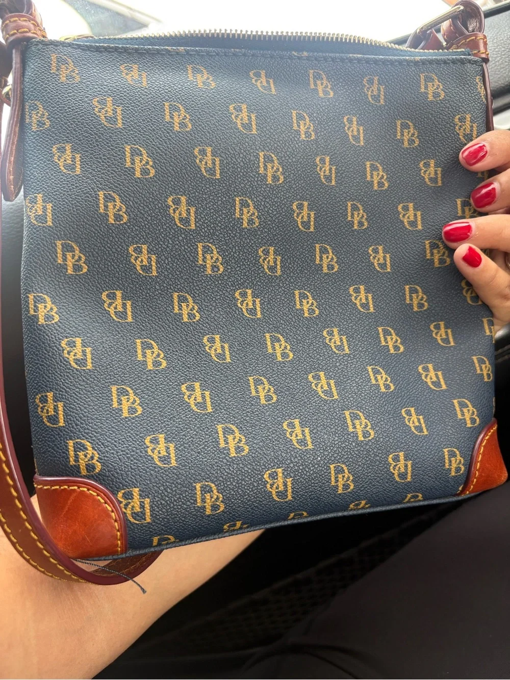 Dooney & Bourke navy with Brown Trim Monogram Crossbody